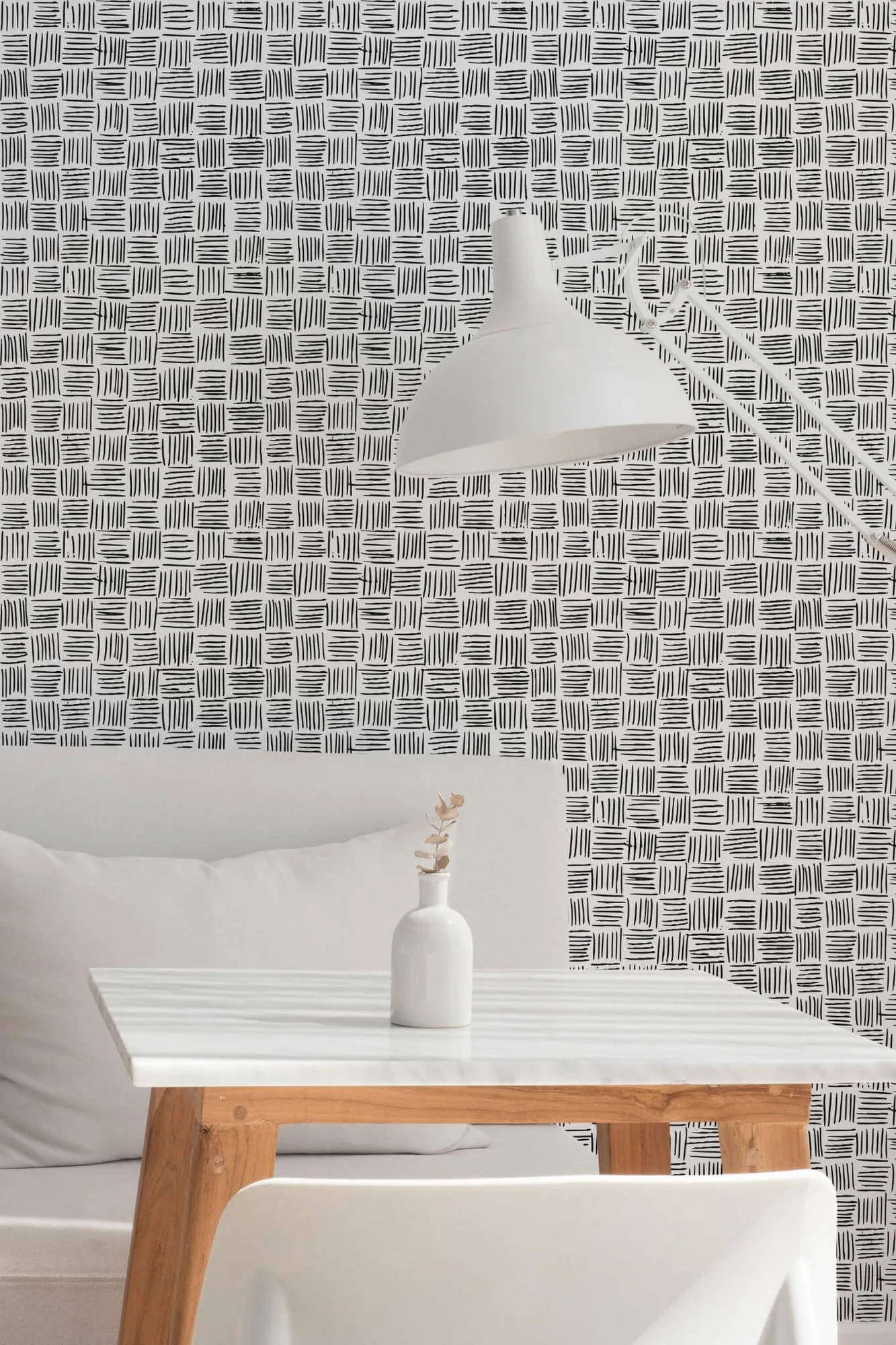 Basket weave brush stroke wallpaper in a room setting: short black brush lines cross into an uneven basket-weave grid on white