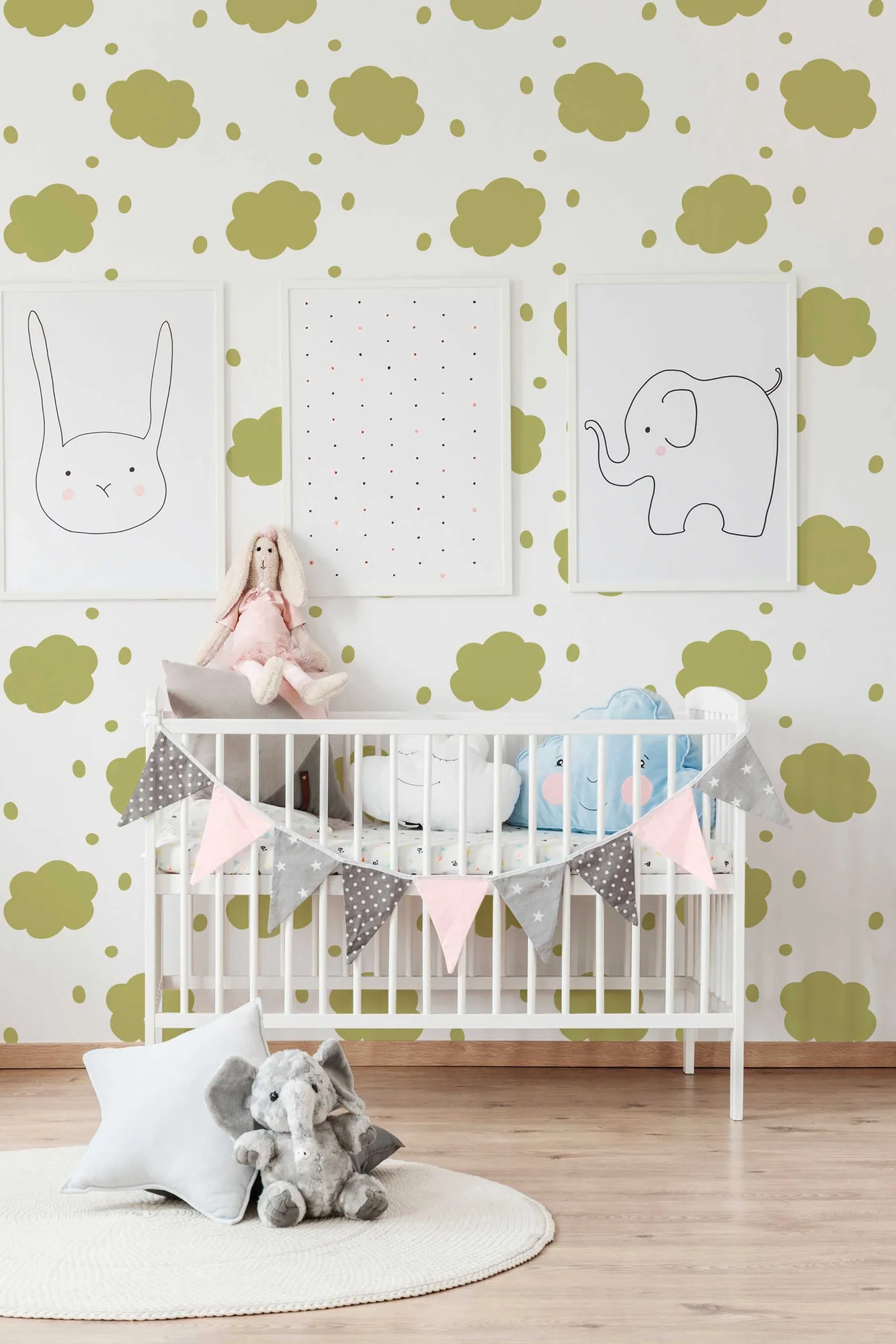 Neutral Nursery Cloud wallpaper in a room setting: watercolor clouds in warm beige and olive tones
