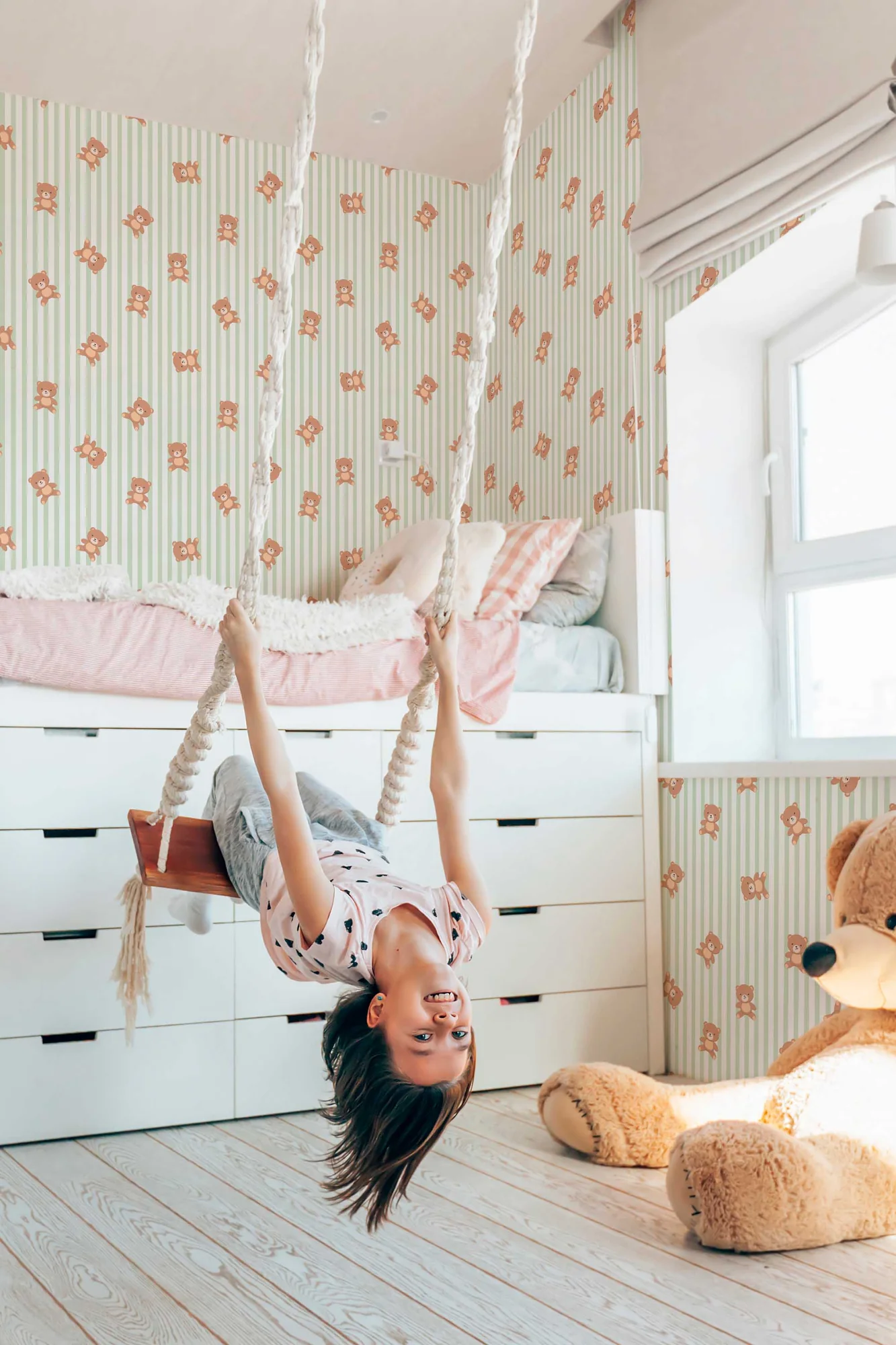 Teddy Bear Striped wallpaper pattern close-up: teddy bears on gentle beige stripes in a sage palette
